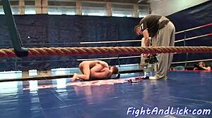 European women wrestle on the floor