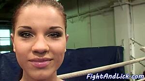 European women wrestle on the floor