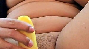 beautiful latina girl explores her tight pussy with a cucumber for the first time in her bedroom.