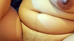 beautiful latina girl explores her tight pussy with a cucumber for the first time in her bedroom.