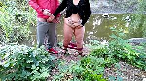 Horny step mom masturbates wet pussy and milks step son's dick outdoors