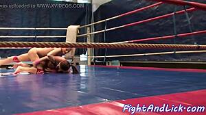 European women wrestle on the floor