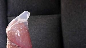 Blonde gives blowjob in close-up view with tits fetish.