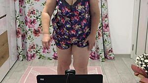 chubby woman shaking in different panties near webcam, showing figure at home