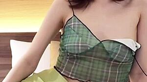 japanese beauty flaunts her midriff in a revealing navel-baring outfit.