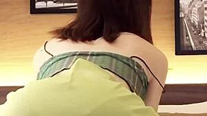 japanese beauty flaunts her midriff in a revealing navel-baring outfit.