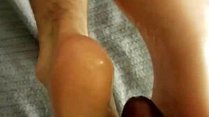 Cumshot aftermath on DirtySocks' feet day 4.