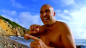 Ever seen anal fucking on a crowded beach? Watch this blonde take it.