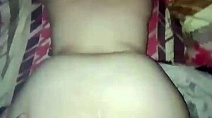 A woman with a big ass bends over on all fours