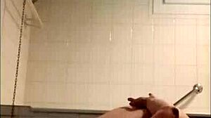 Slave endures self-inflicted humiliation with belt lashes