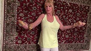 mature drives massive dildo into her pink cherry