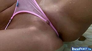 Big Tits Girl in Bikini Masturbates Shaved Pussy Poolside