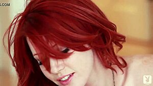 Elle Alexandra performs bold striptease for Playboy, undressing and ripping clothes in redhead solo.