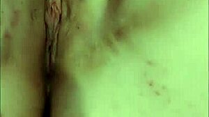 Young woman relaxes with toys in solo session