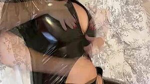 i enjoy the big natural breasts covered in latex kneading breasts