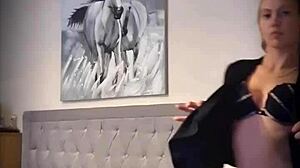 Little teaser performs striptease while teasing and undressing