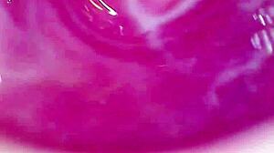 camera plunges deep into wet pussy capturing intense orgasm