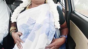 Indian bhabi enjoys a romantic car ride with Telugu conversations.
