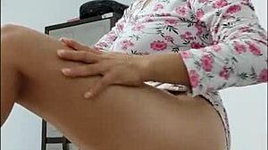 Milf dances seductively, showcasing her beautiful ass and big nipples