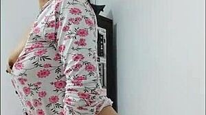 Milf dances seductively, showcasing her beautiful ass and big nipples