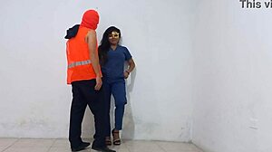 Nurse interacts with cleaning staff in hospital