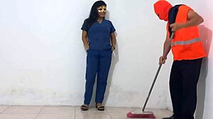 Nurse interacts with cleaning staff in hospital