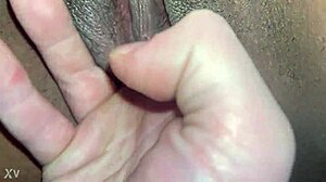 White guy fingers black wet pussy with intense strokes
