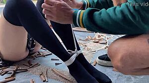 is that hottie in stockings getting tied up and tickled?