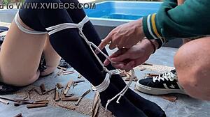 is that hottie in stockings getting tied up and tickled?