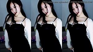 chinese girl dances sensually in traditional outfit