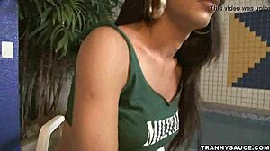 Brunette Transsexual Hottie Masturbates Her Cock By The Pool In Solo Scene