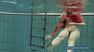 katya okuneva in red dress by the pool