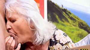 gorgeous mature woman INTENSELY SUCKS waiter's cock at desk while husband watches