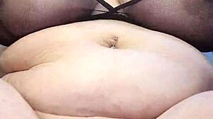 Curvy latina bbw stretches to take every inch of her 9-inch dildo