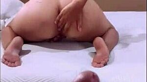 This big ass Latina redhead with curly hair masturbates so intensely