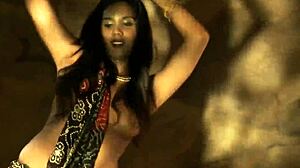 brunette milf performs intense seductive striptease, ripping clothes