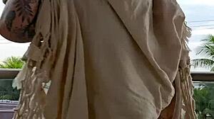 Watch me flash my ass on the balcony! So thrilling and risky.