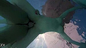 Underwater lesbian strap on sex