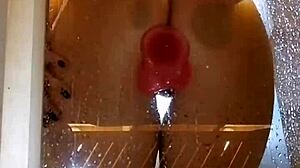 Girl Teases Her Appetizing Ass with Pink Dildo in Shower!