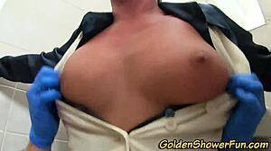 fetish enthusiast receives golden shower