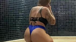 Blonde liberal and friend tease photographer at pool