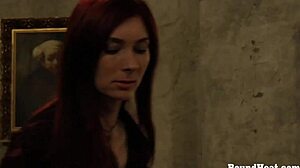 Putting slave mark on her pussy in femdom bondage