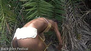 Skinny African Tribe Woman Working Outdoors