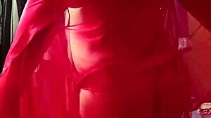 Boldly modeling red lingerie.