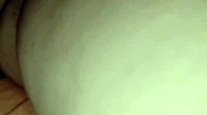 Perra madura masturbates with her consolador, teasing pleasure.