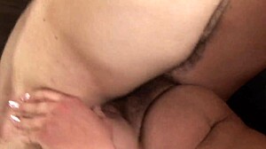 Mature woman with hairy pussy and one leg fucked on couch