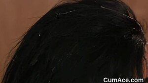 nasty hottie gets cum load on her face swallowing all the jizm in bukkake blowbang.