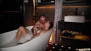 I help my stepmom relax and fuck her in a hot bathtub.