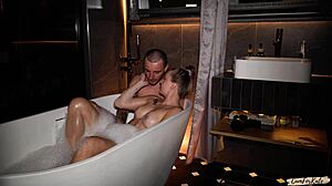 I help my stepmom relax and fuck her in a hot bathtub.