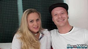 blonde wife relaxes next to her husband